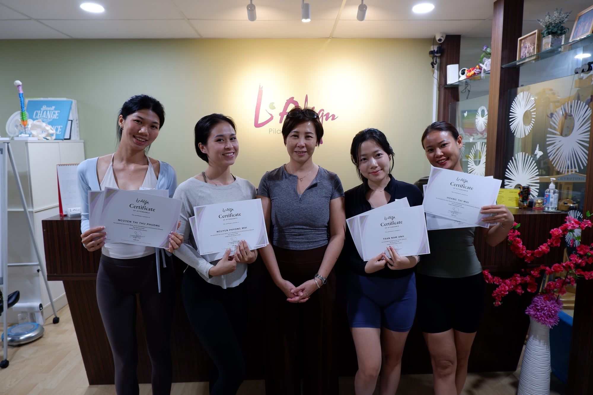KIWI instructors holding their certificates at b. Align Academy